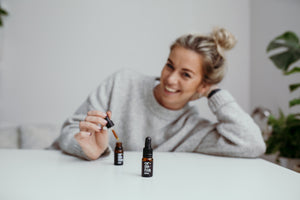 Woman laughing with Organia oil